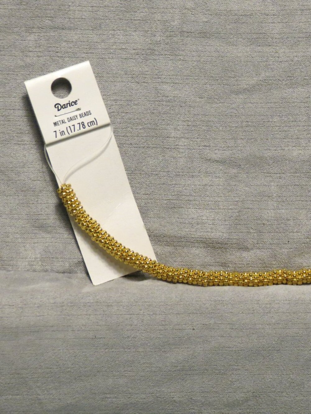 Darice Metal Daisy Beads Gold 6mm, 7" strand on original card